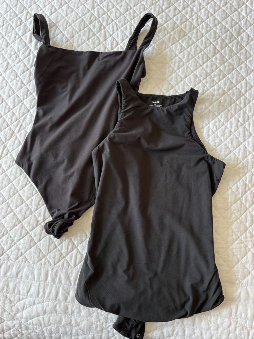 TWO Black SKIMS Bodysuits